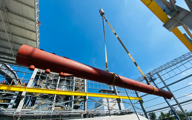 Pipe being put in place by crane