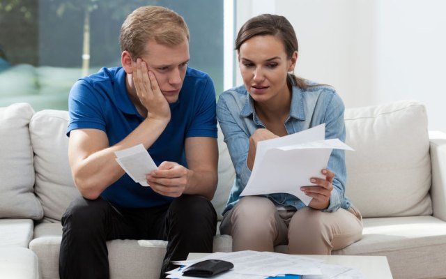 Couple looking at bills